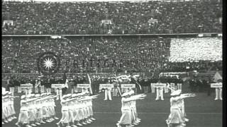 Hitler presides over the opening of the 1936 Olympics while US team member JessHD Stock Footage [upl. by Banquer]