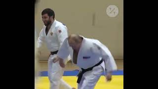 Putin Spars With Russian Judo Team [upl. by Auoh]